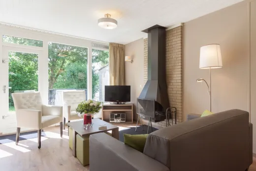 Woonkamer in 1 van de bungalows