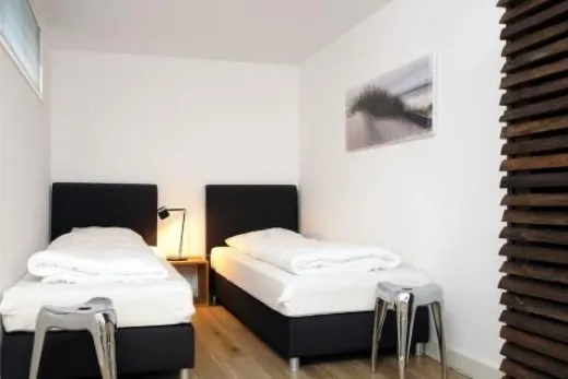 Moderne slaapkamer in 1 van de vakantiehuisjes